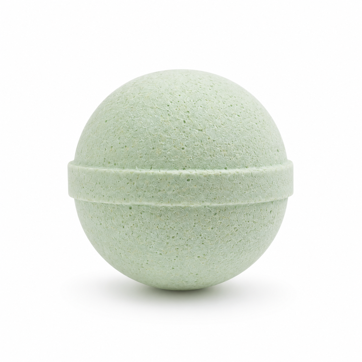 Green bath bomb on a white background