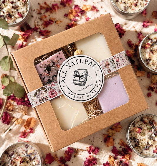 Box of All Natural Herbal Hand Soap with decorative elements on a floral background