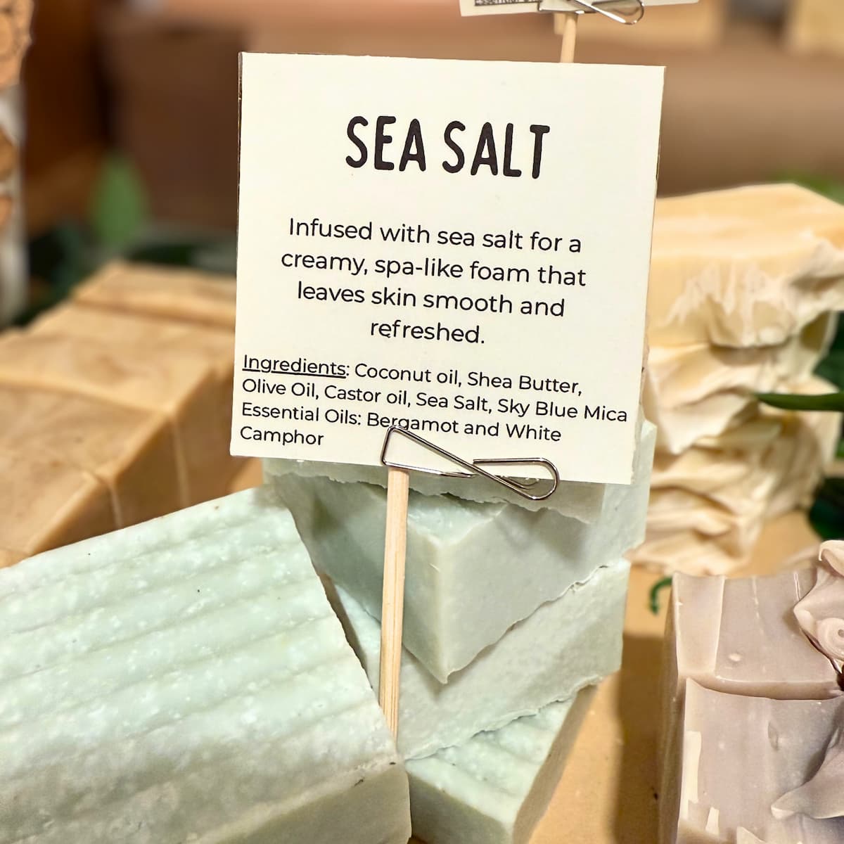 Bar of sea salt soap with a label detailing ingredients and benefits