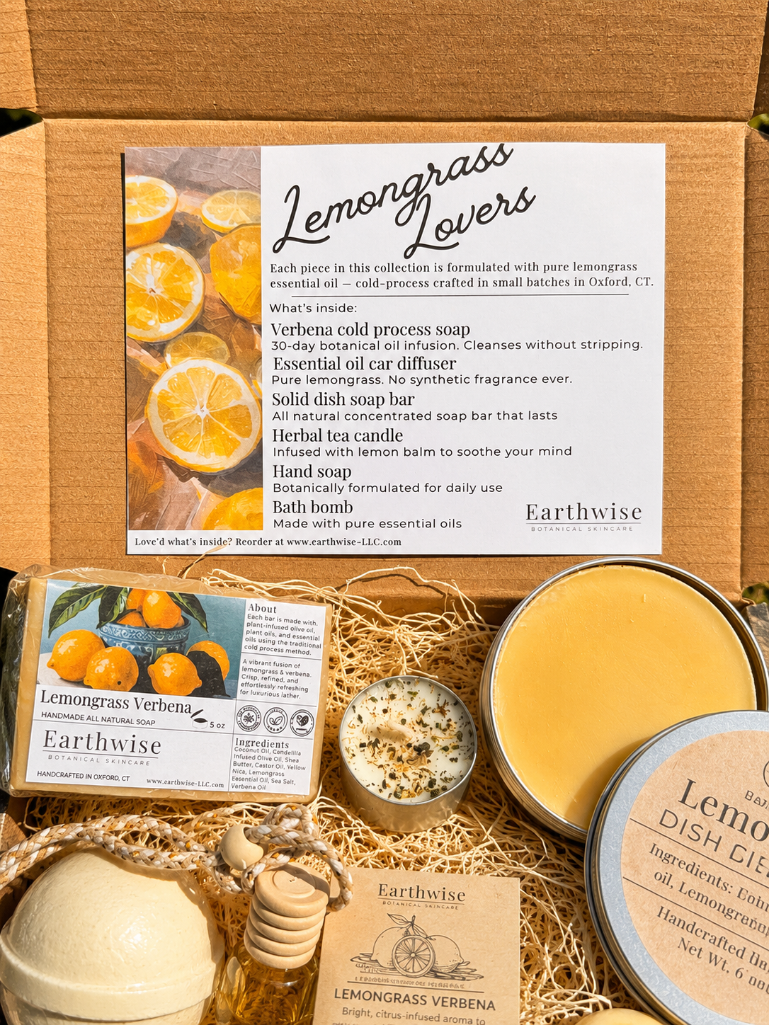 Earthwise Lemongrass Verbena product set including soap, candle, and dish soap in a box.