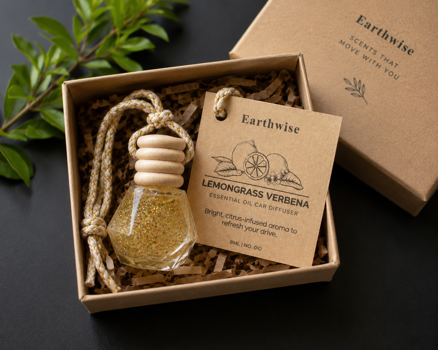Earthwise lemon grass verbena essential oil car diffuser in a box with a label on a dark background
